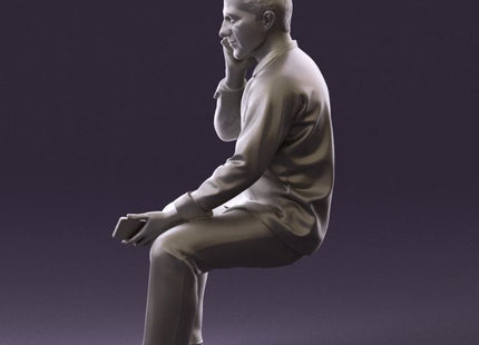 Smart Male Sitting Talking On A Mobile Phone Figure