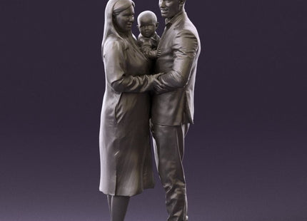 Young Couple Posing With Child Figure