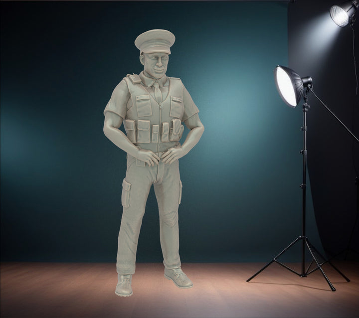 MM273 Male UK Police Officer in Body Armor and Cap