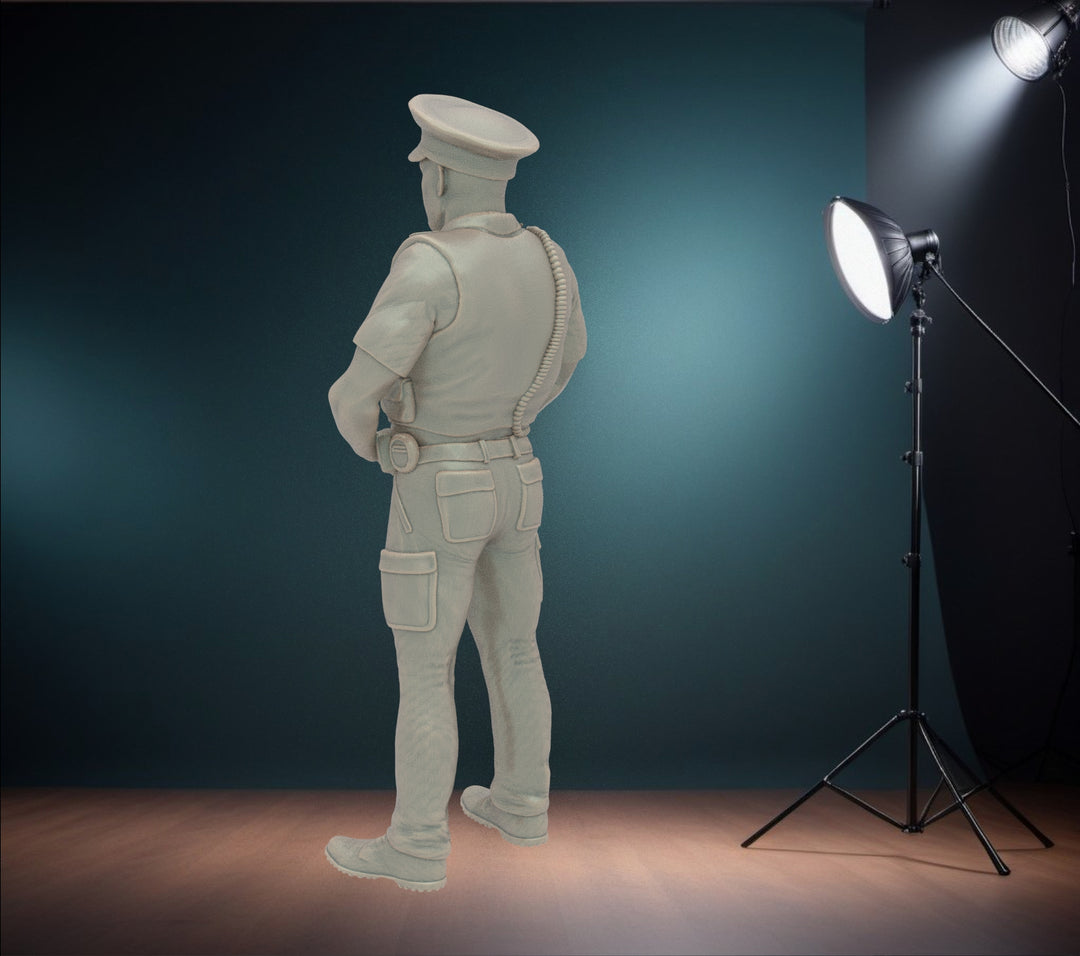 MM273 Male UK Police Officer in Body Armor and Cap