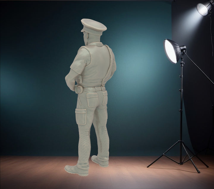 MM273 Male UK Police Officer in Body Armor and Cap