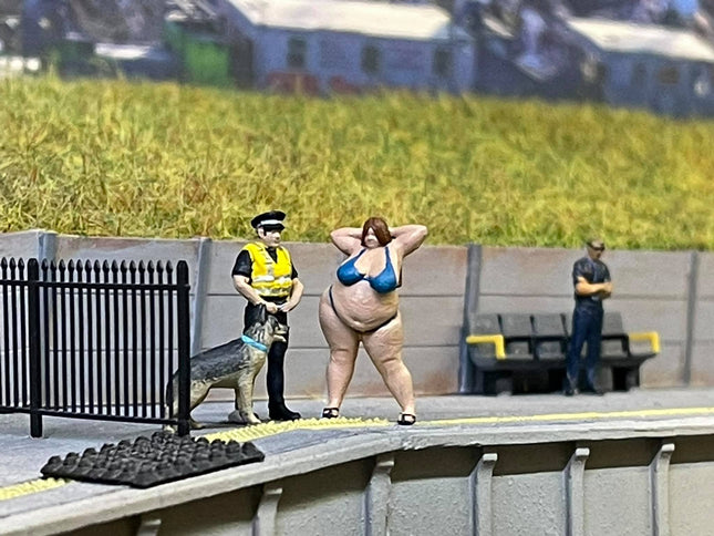 Large Male With Very Large Lady Taking Pictures Figure