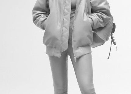 Female In Leather Jacket And Shoulder Bag Figure