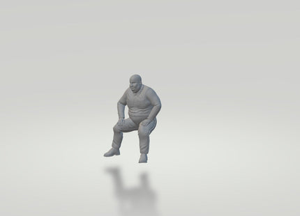 Large Male Sitting Down Figure