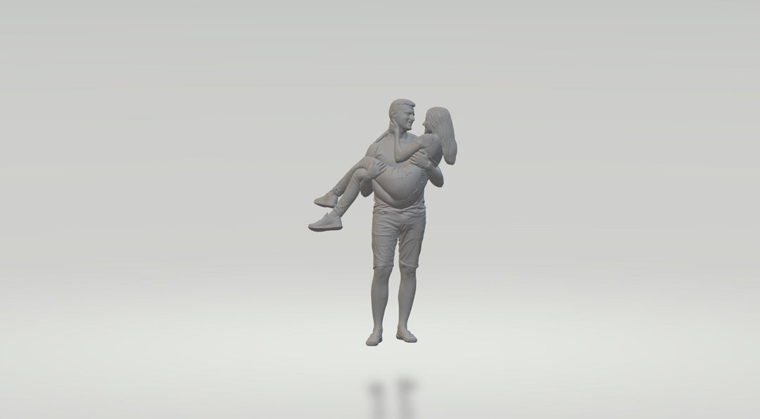 Young Couple Female In Arms Of Male Figure
