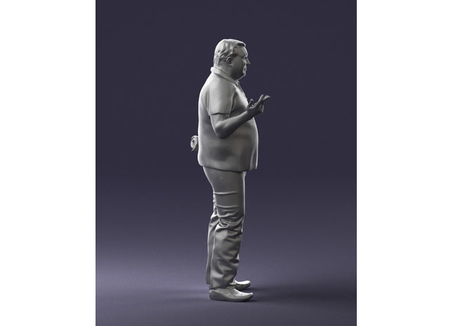 Older Male With Newspaper And Smoking Figure