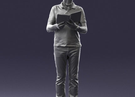 Older Male Standing Reading Book Figure