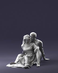 Young Couple Sitting On Ground Figure